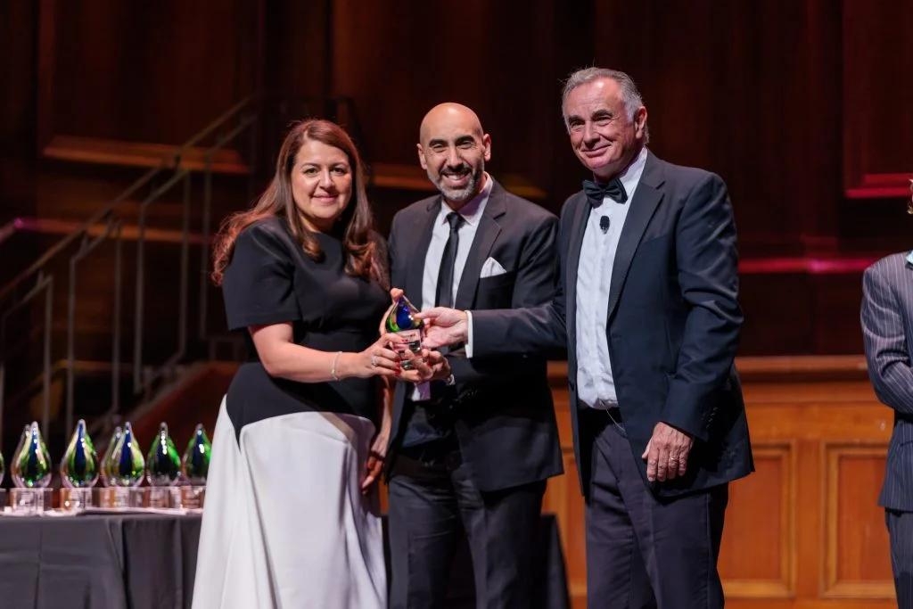 Dr Angelos Sourial and Marianne Sourial accepting Practice of the Year at the Australian Dentistry Awards 2025