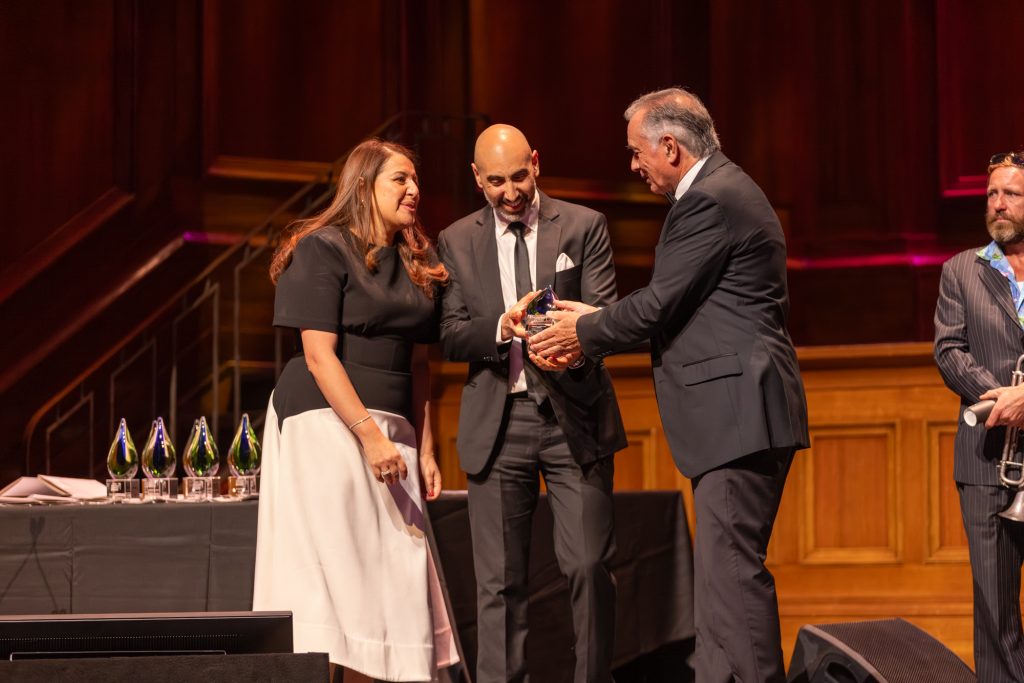 Marianne Sourial and Dr Angelos Sourial accepting an award at the Australian Dentistry Awards 2025